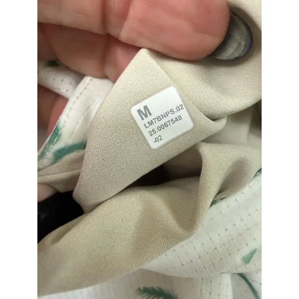 Lululemon Men's Medium swim shorts white base green floral print